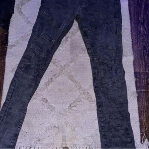 Black and gray army fatigue jeans.